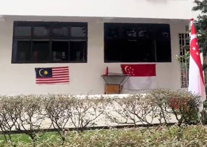 Solidariti Bendera Malaysia dan Singapura digantung di luar flat  Singapura